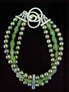 Green freshwater pearl, peridot and sterling bracelet - $145