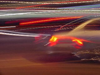 Car On The Road With Brake Lights