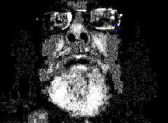 Self-portrait: underexposure creats an effect like a German expressionist woodcut.