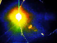 Ordinary yellow street lamp on digital flim. Self-portrait in silhouette.